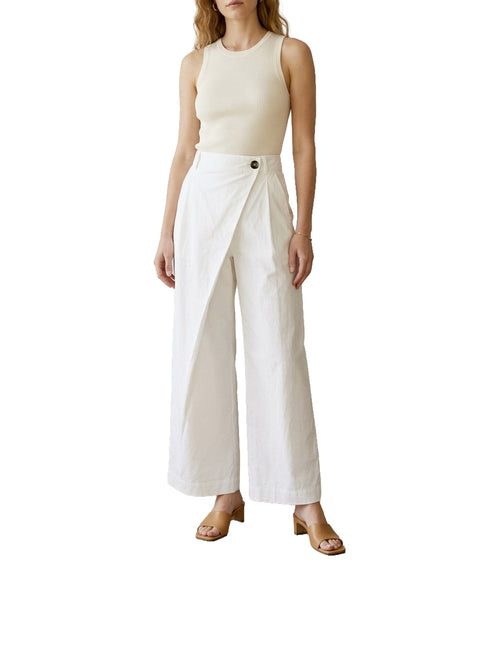 Pantalone asimmetrico con bottone