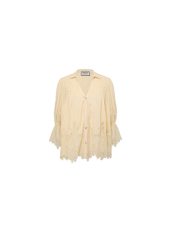 Blusa cropped in pizzo